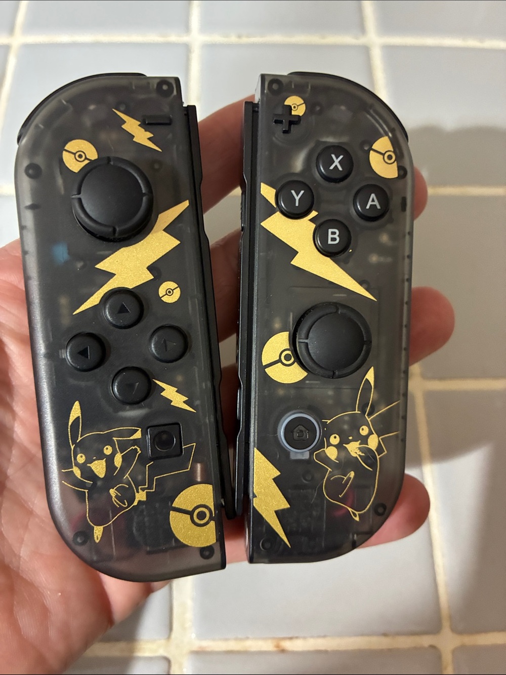Nintendo Black Translucent Joy-Con Pair with Gold Pikachu Accents